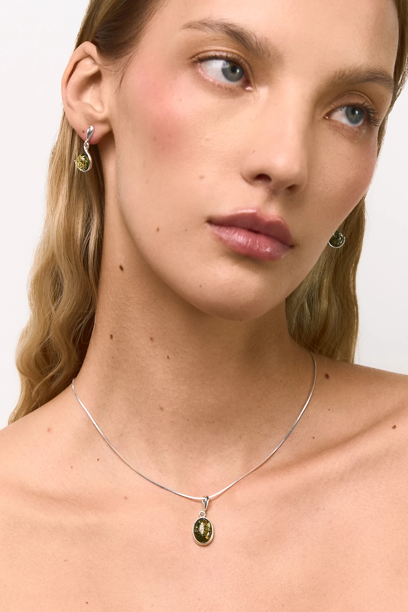 Thumbnail of Amore silver earrings with green amber