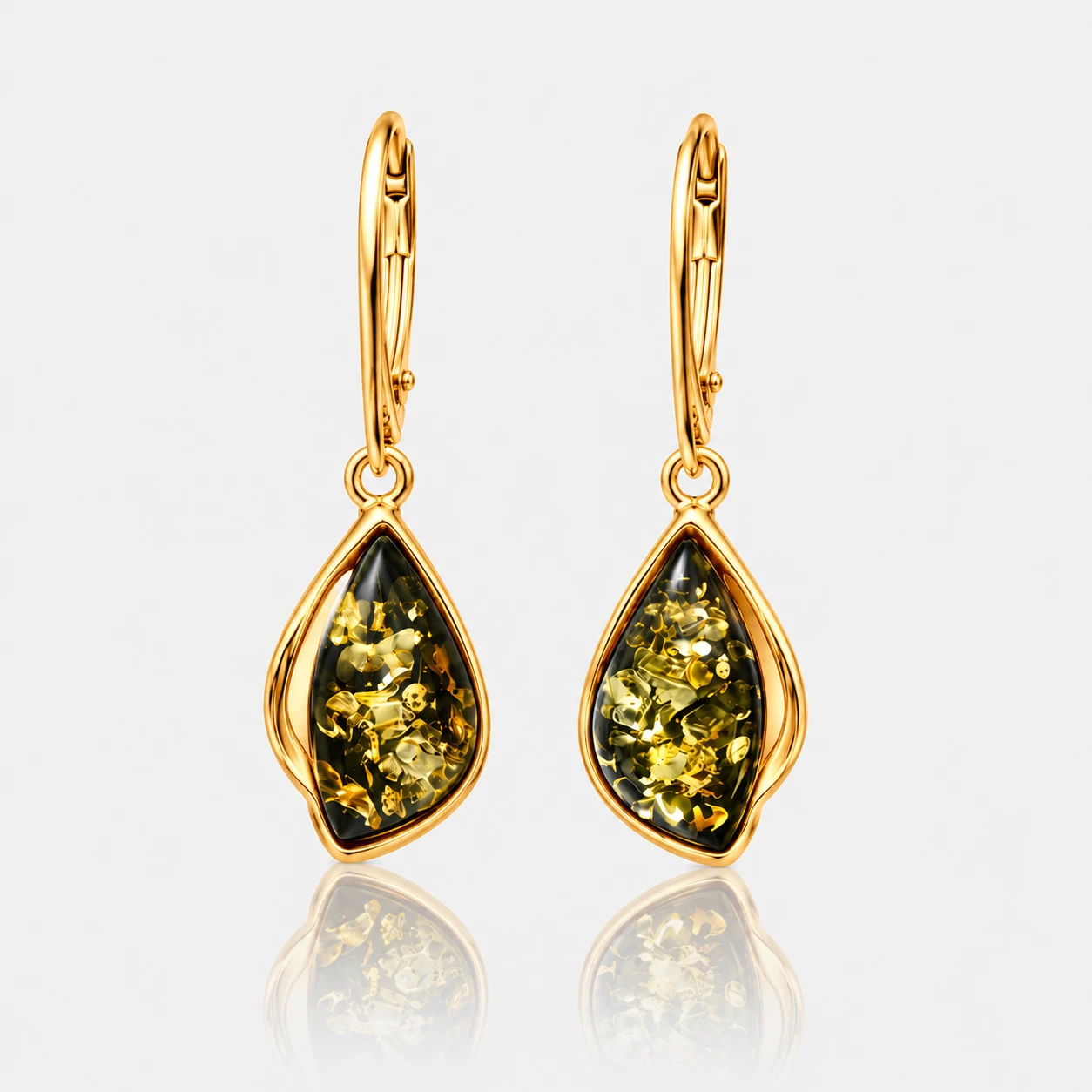 Celine earrings in gold with green amber