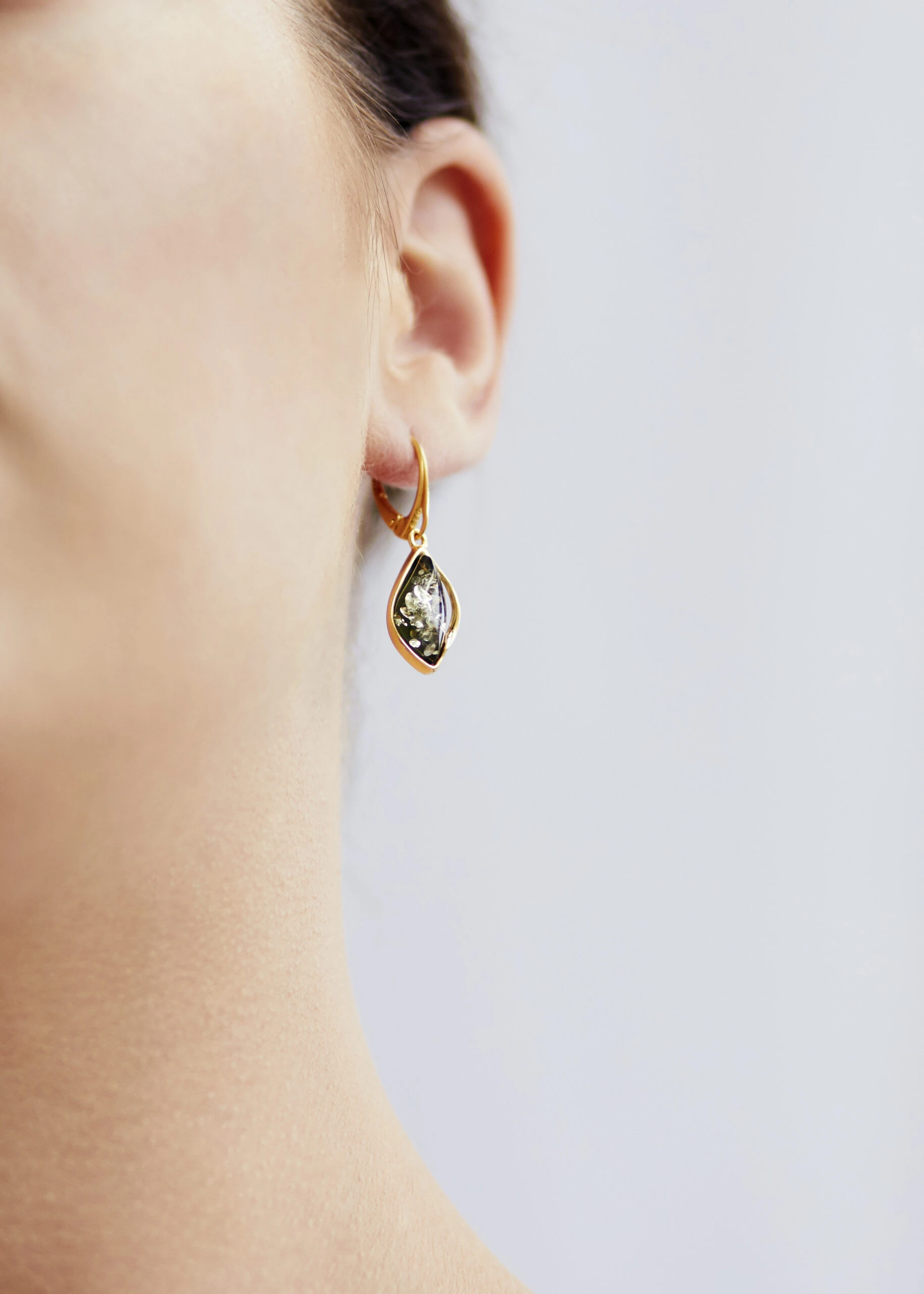 Thumbnail of Celine earrings in gold with green amber