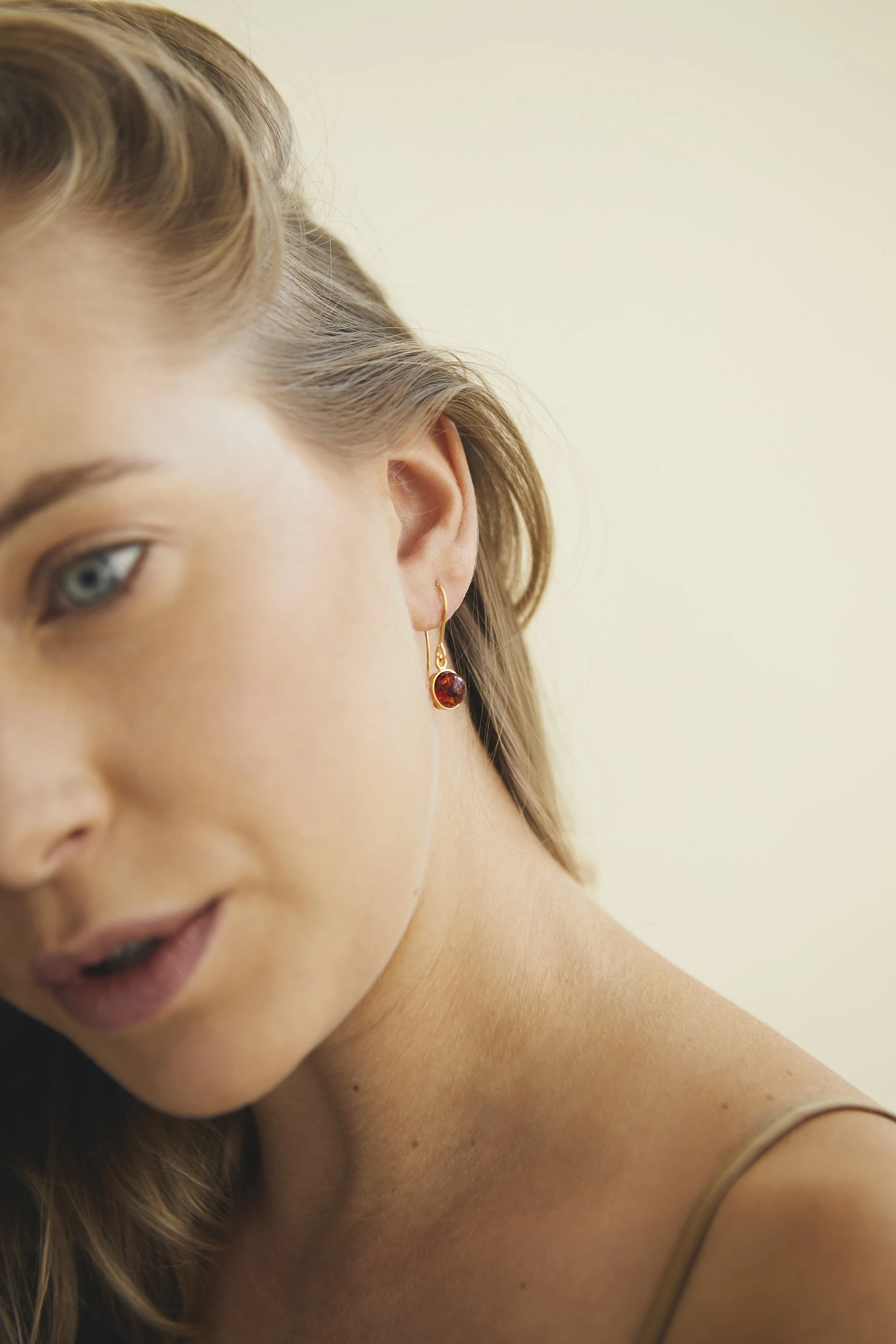 Thumbnail of Chloe gold earrings with cognac amber