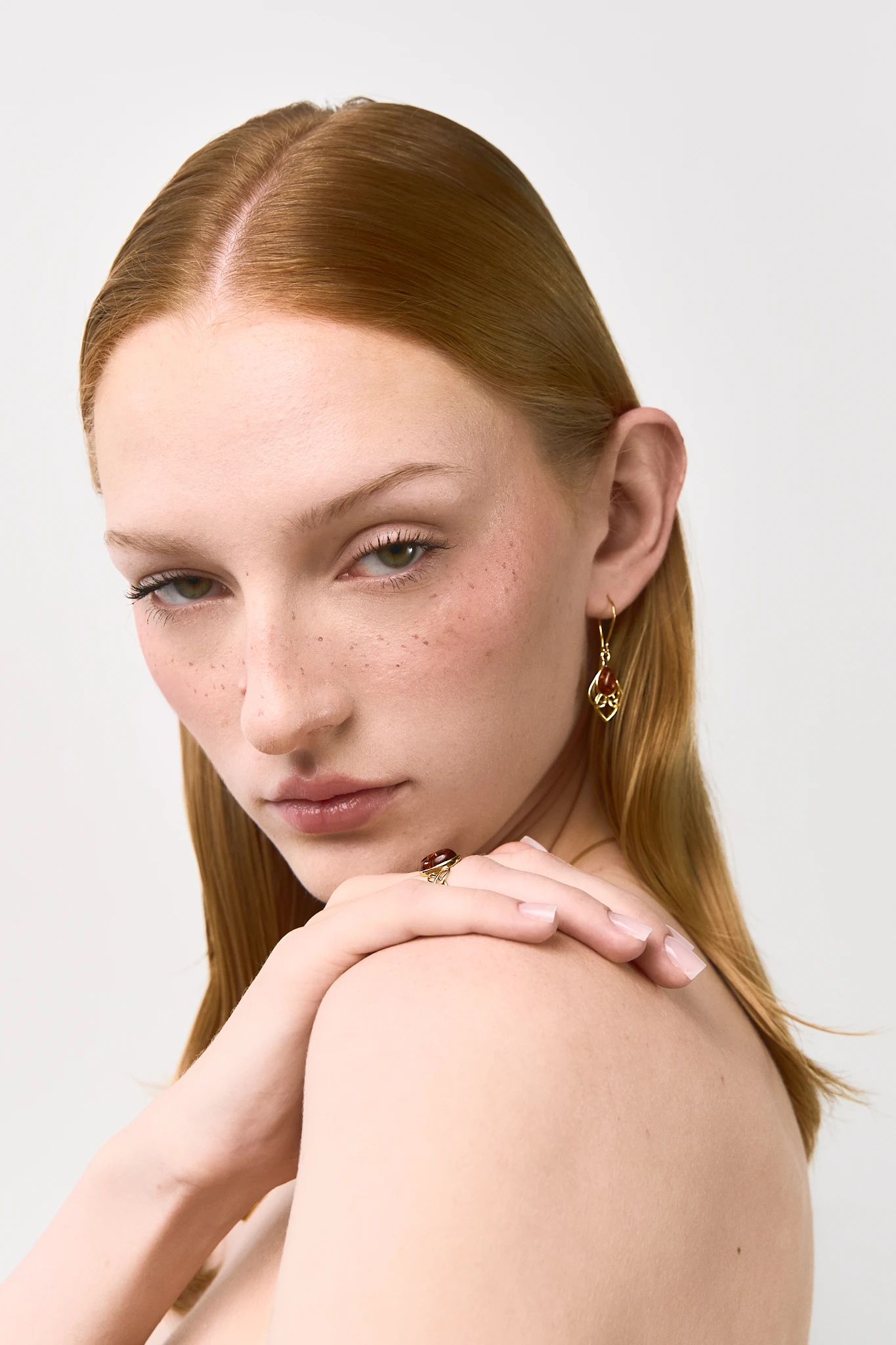 Eternal beauty meets Viking symbolism with these gold earrings featuring Baltic amber 🌟 Handcrafted, nickel-free, and perfect for sensitive ears. Unique piece inspired by Scandinavian history! #AmberEarrings #VikingInspired