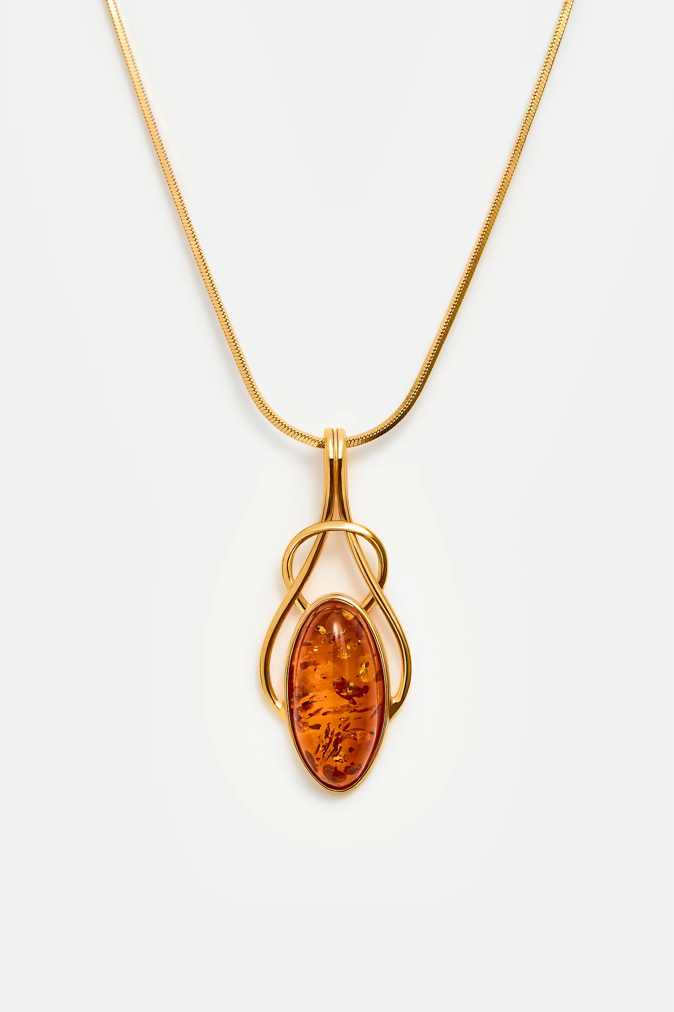 Connection gold necklace with amber