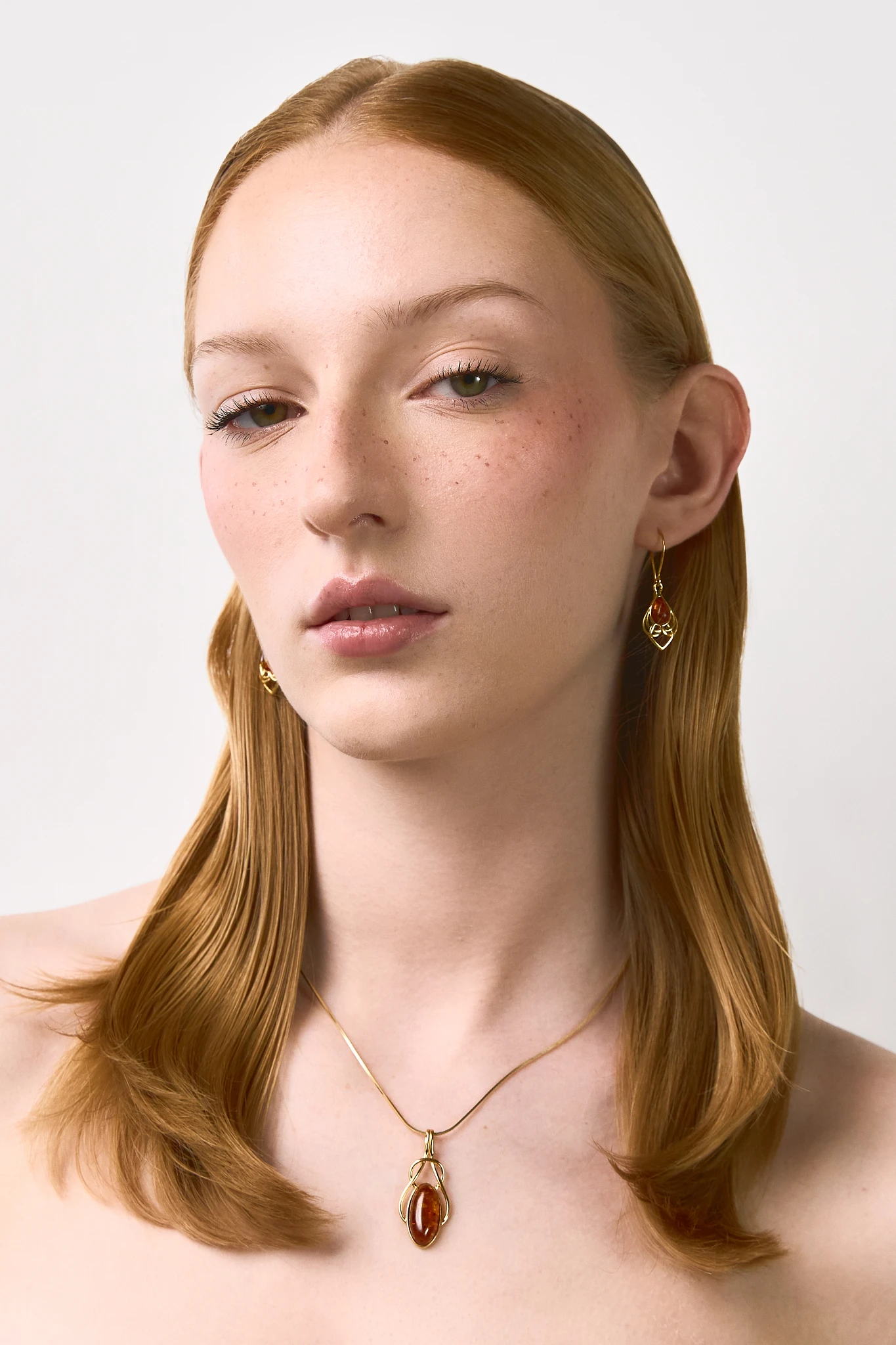 Elevate your style with our Connection gold necklace featuring genuine Baltic amber. Handmade and full of symbolic meaning. 🌟 #AmberNecklace #UniqueJewelry