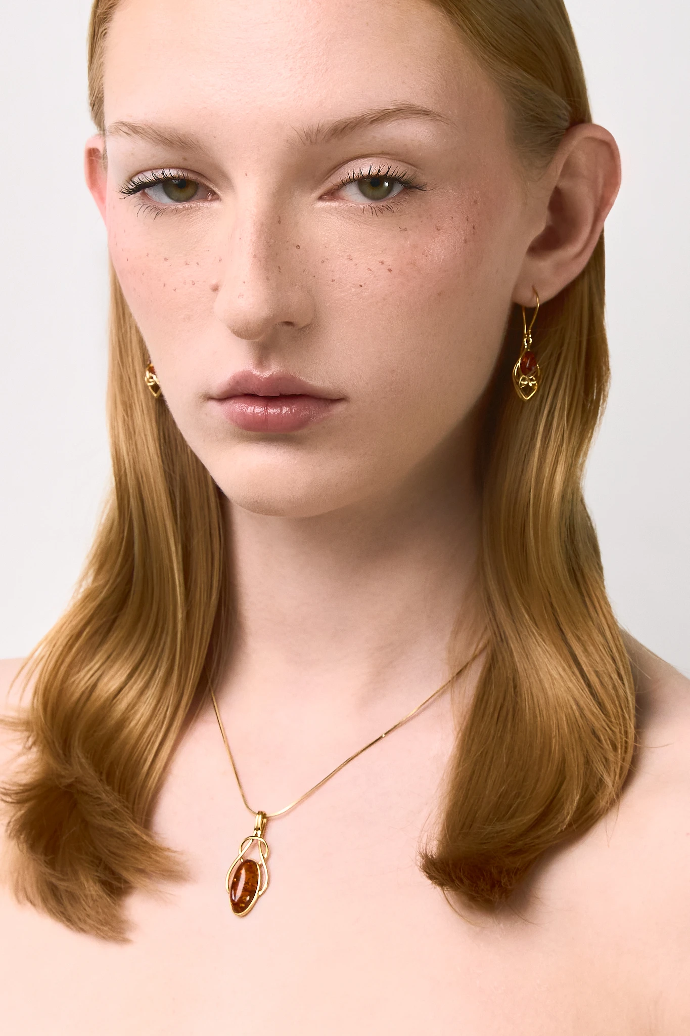 Elevate your style with our Connection gold necklace featuring genuine Baltic amber. Handmade and full of symbolic meaning. 🌟 #AmberNecklace #UniqueJewelry