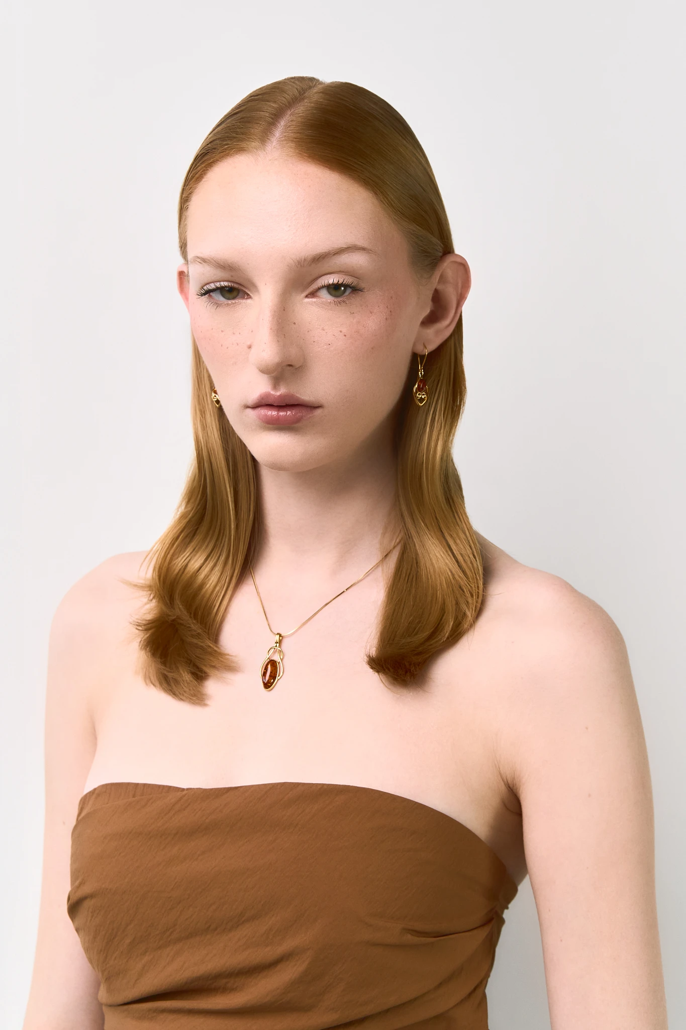 Elevate your style with our Connection gold necklace featuring genuine Baltic amber. Handmade and full of symbolic meaning. 🌟 #AmberNecklace #UniqueJewelry