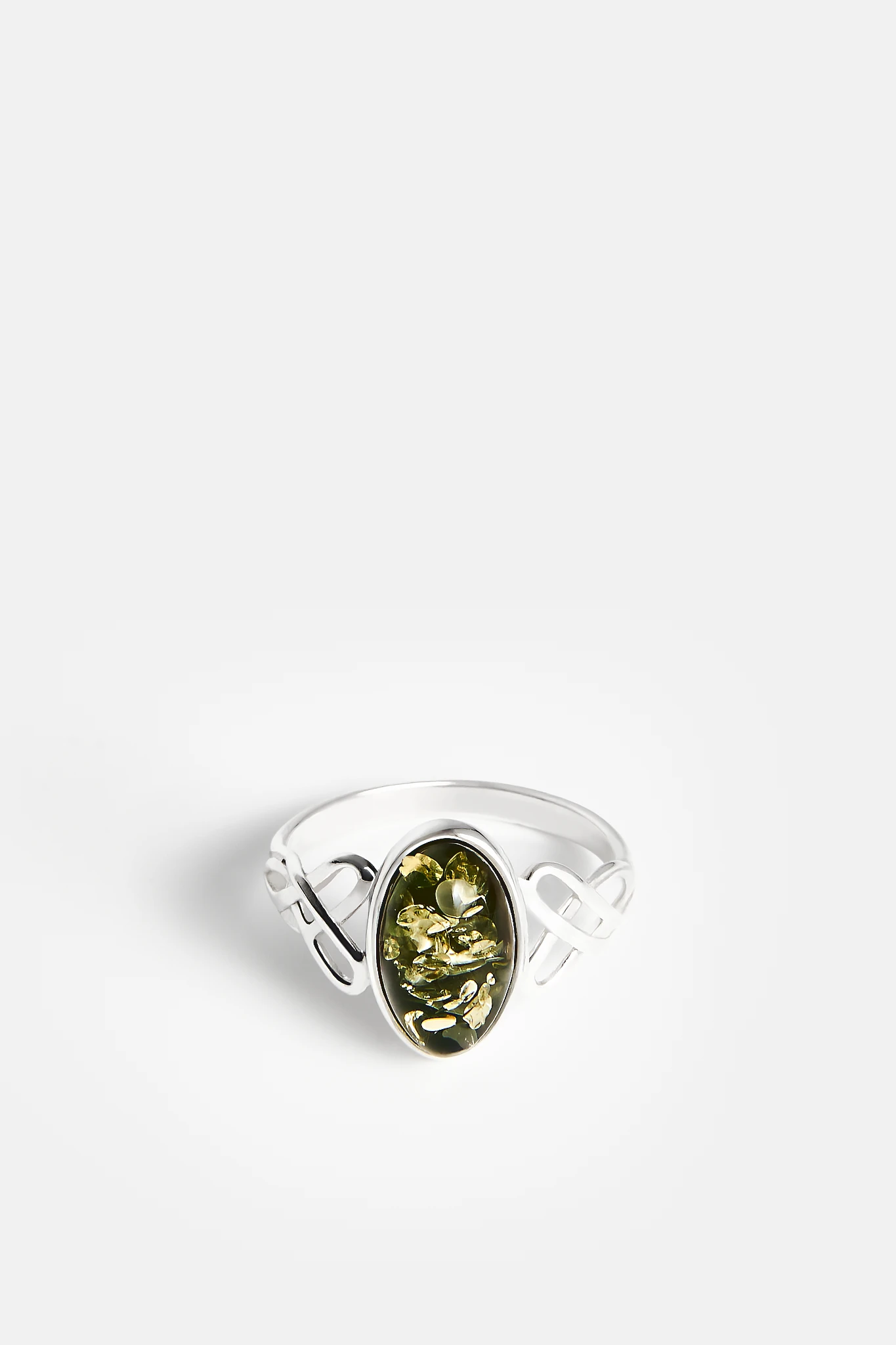 "Embrace eternal connection with our sterling silver ring adorned with green amber 🌿 Symbolizing balance and protection, hand-made with love. Perfect for those who seek jewelry with a story. #AmberRing #ScandinavianInspired"