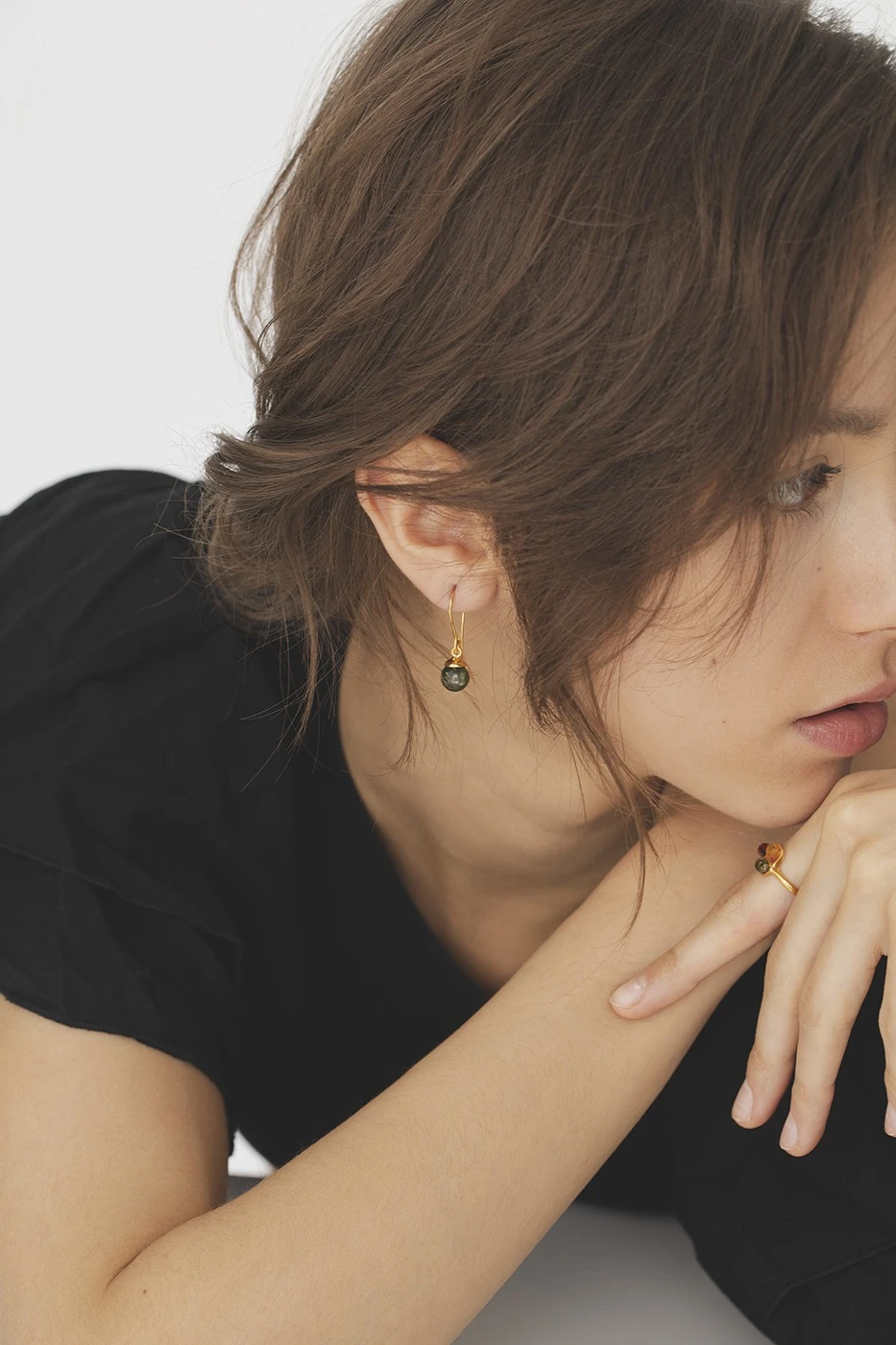 Thumbnail of Diana gold earrings with green amber