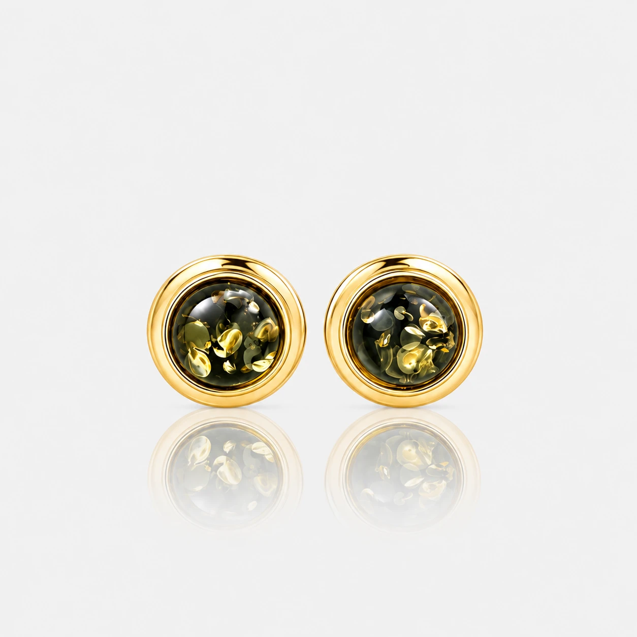 Dot studs med grøn rav