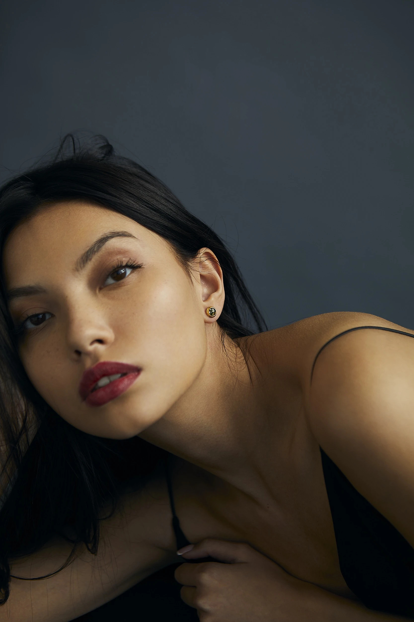 Dot studs with green amber