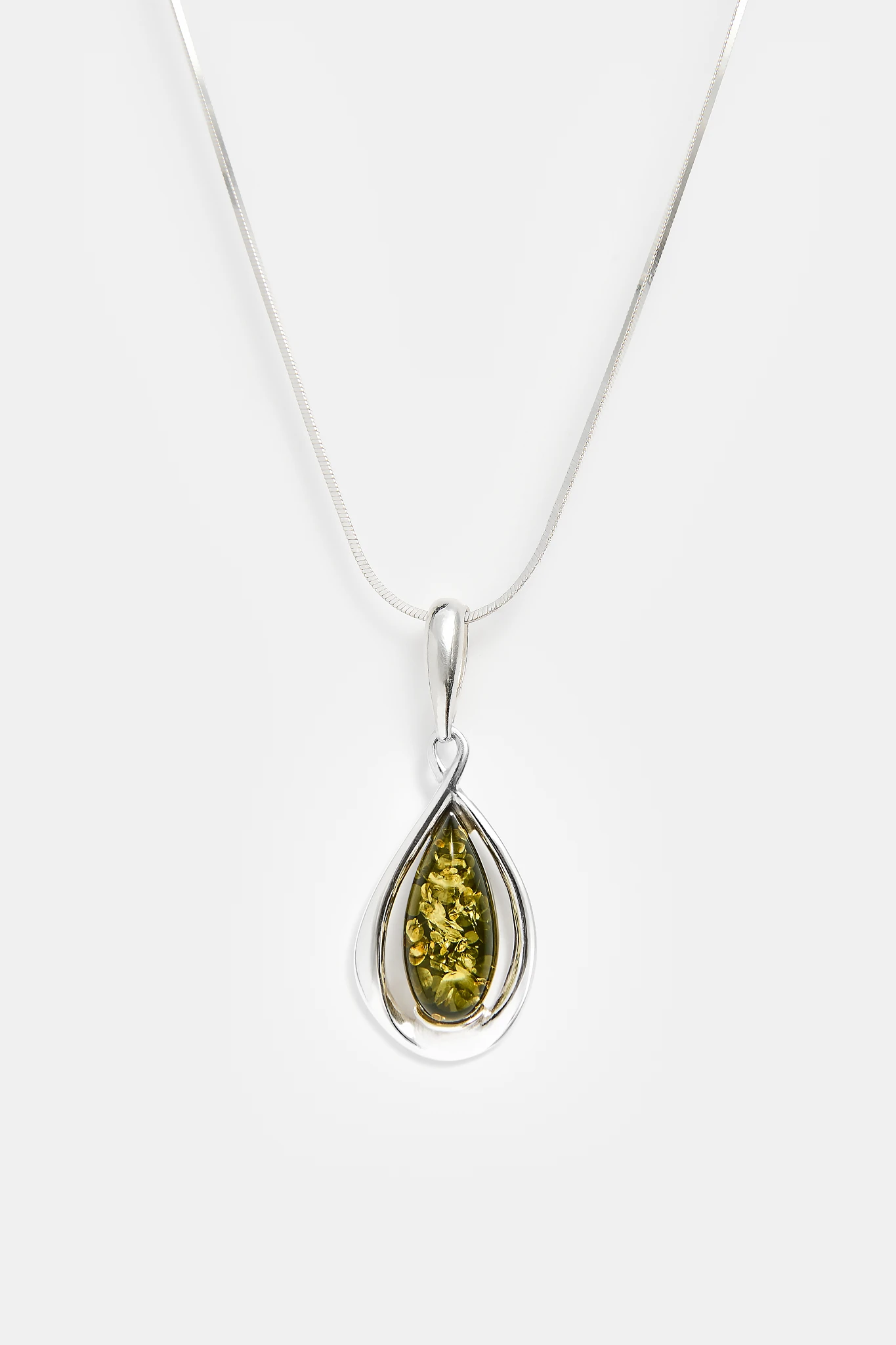 Drop silver necklace with green amber