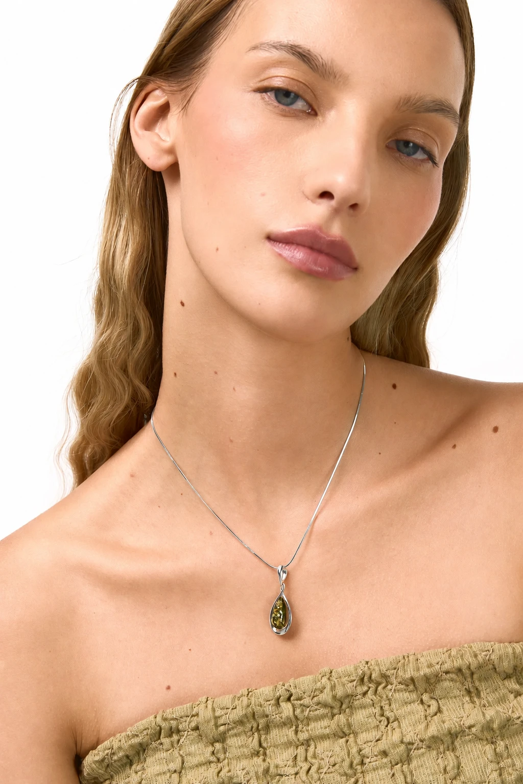 Drop silver necklace with green amber