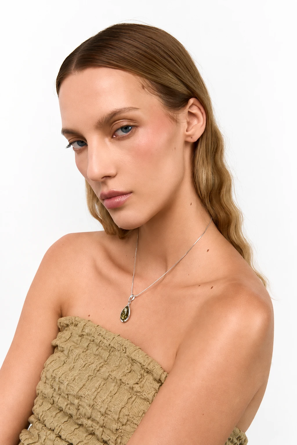 Drop silver necklace with green amber