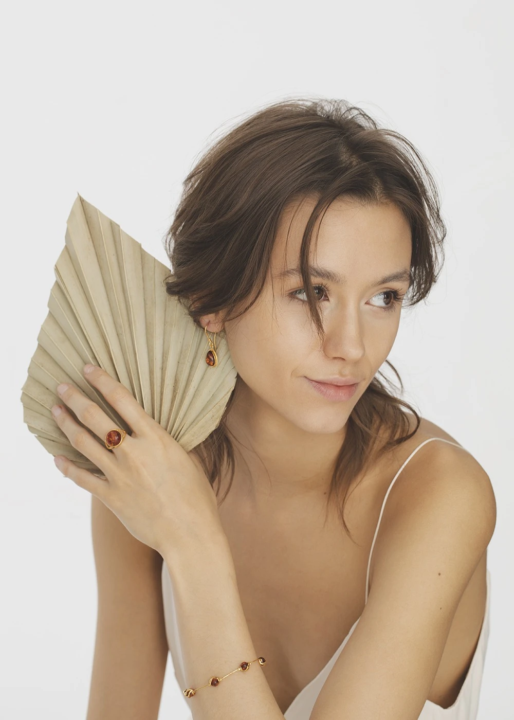 Thumbnail of Florence gold earrings with cognac amber