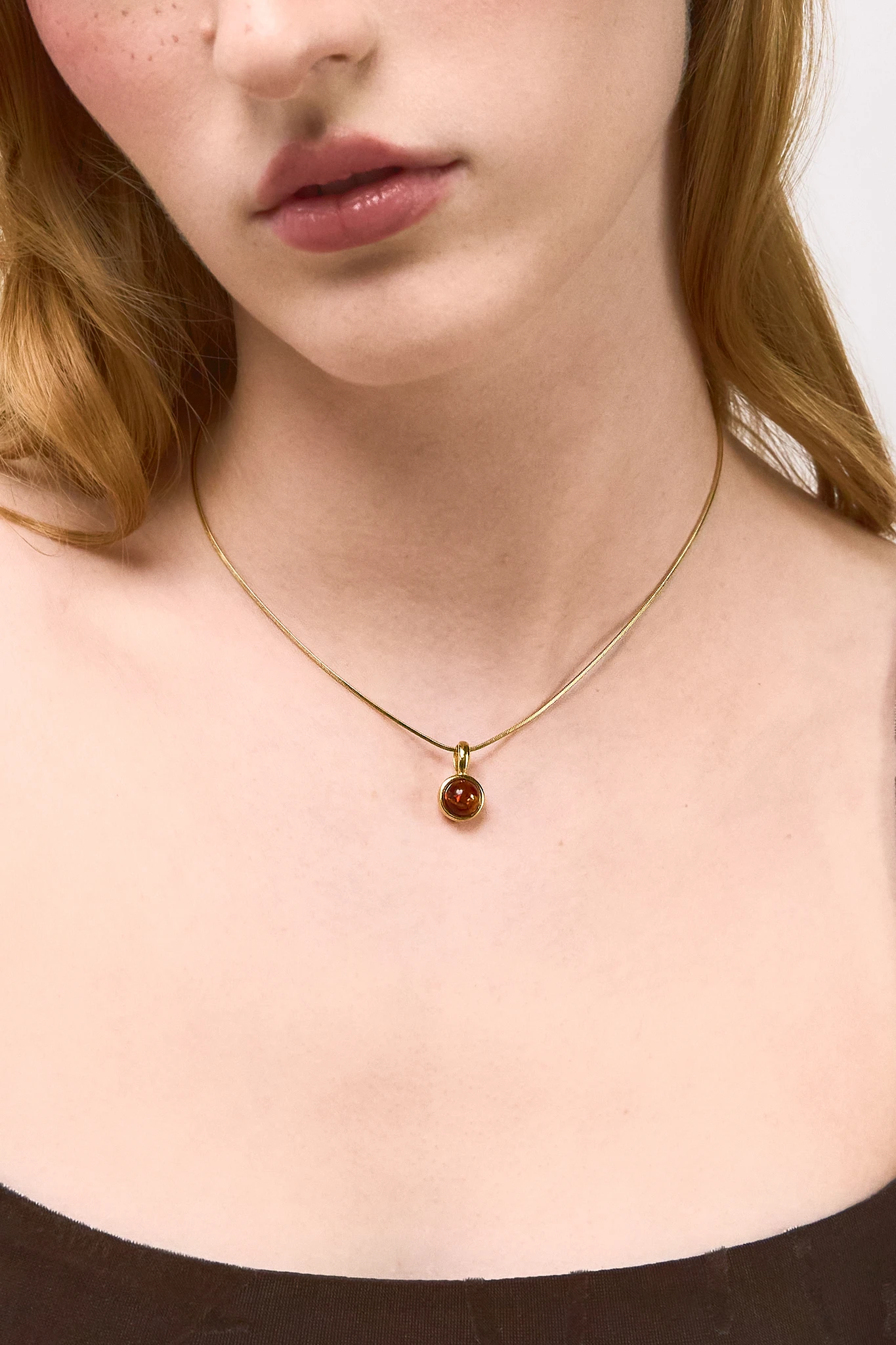 Thumbnail of Grace necklace in gold with cognac amber