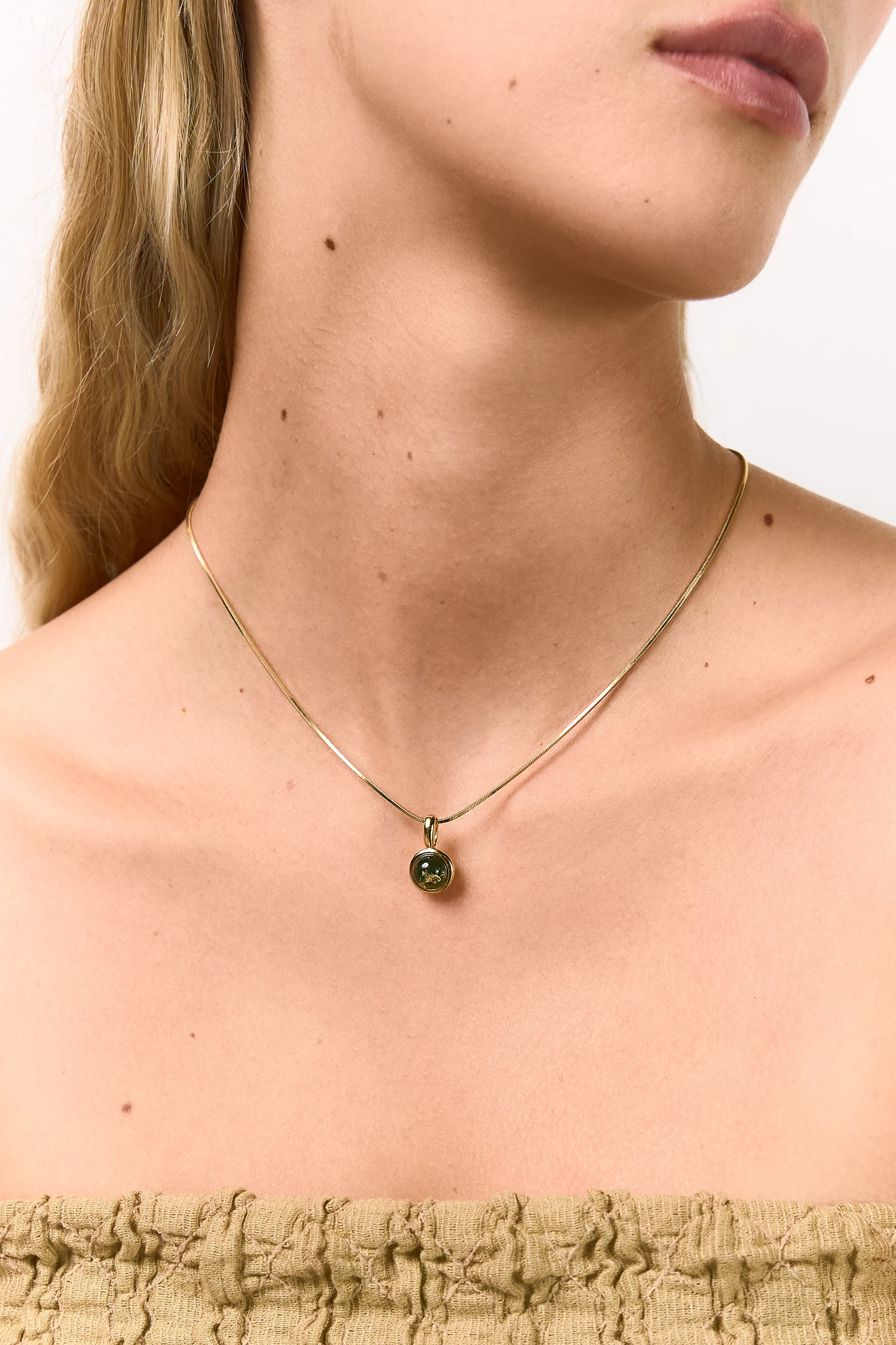 Thumbnail of Grace necklace in gold with green amber