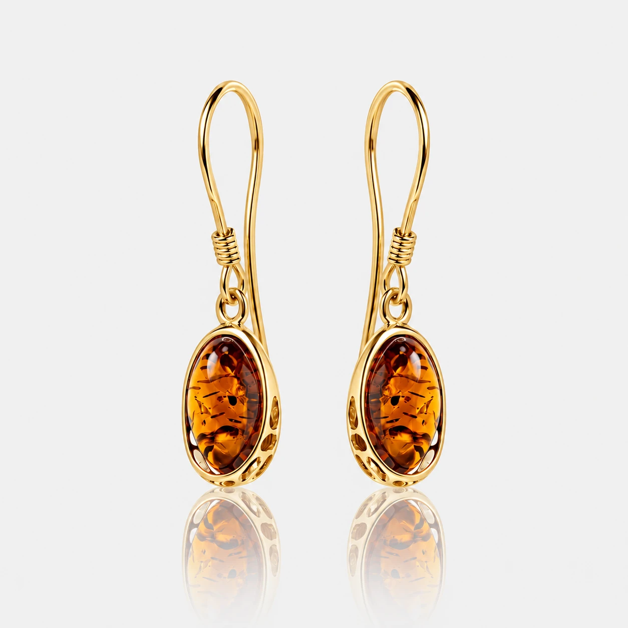 Harmony guld øreringe med cognac amber