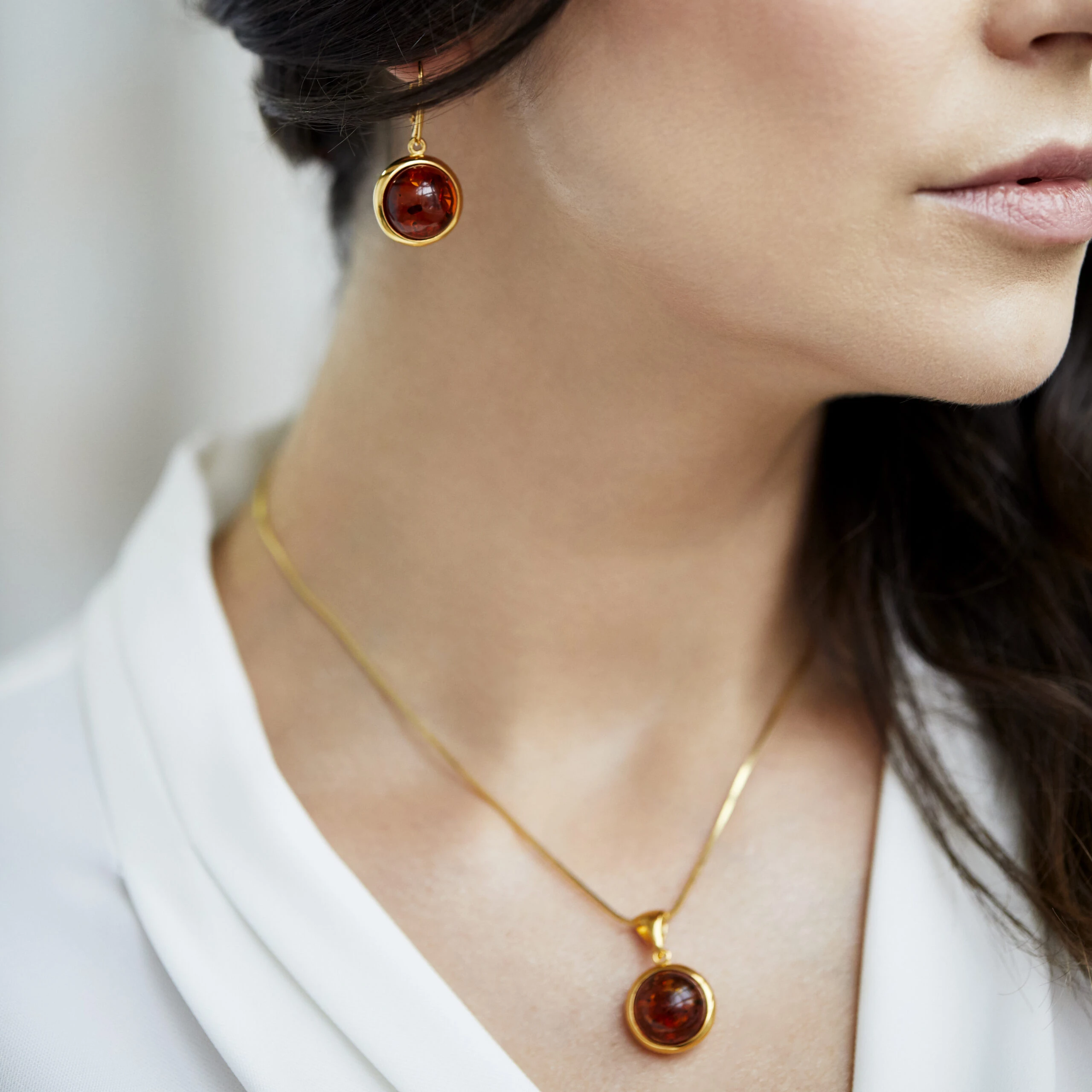 Thumbnail of Luna earrings in gold with amber