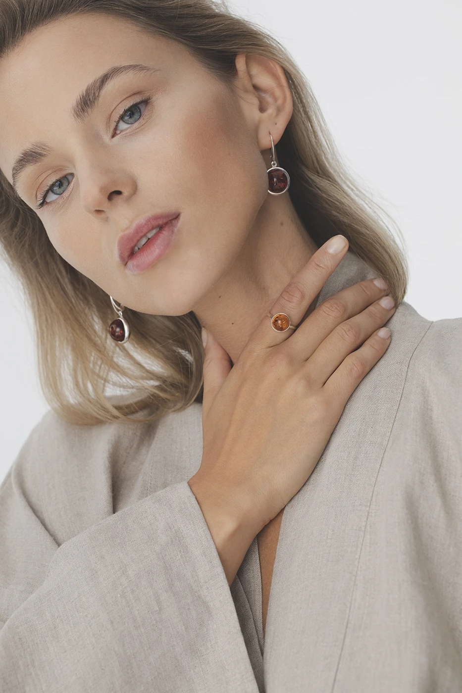 Thumbnail of Luna earrings in silver with cognac amber