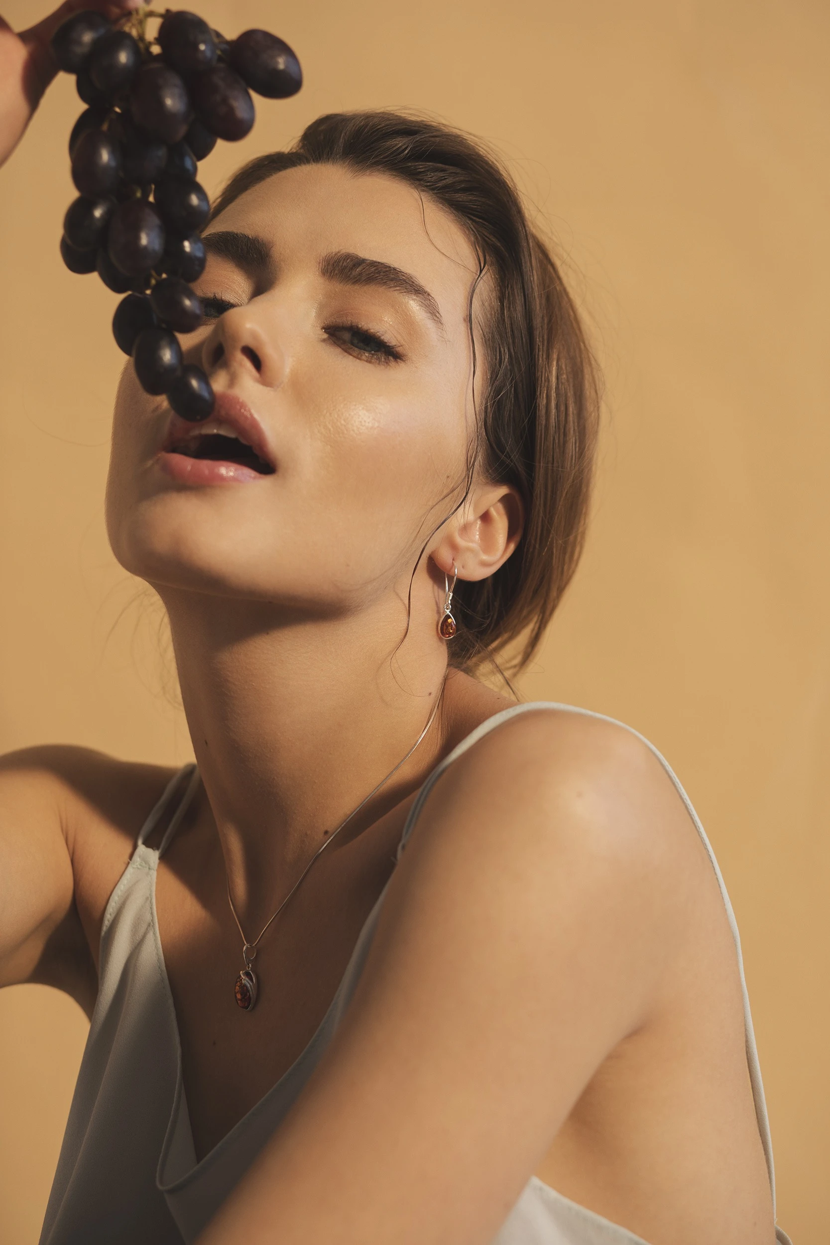 Thumbnail of Merci silver earrings with cognac amber