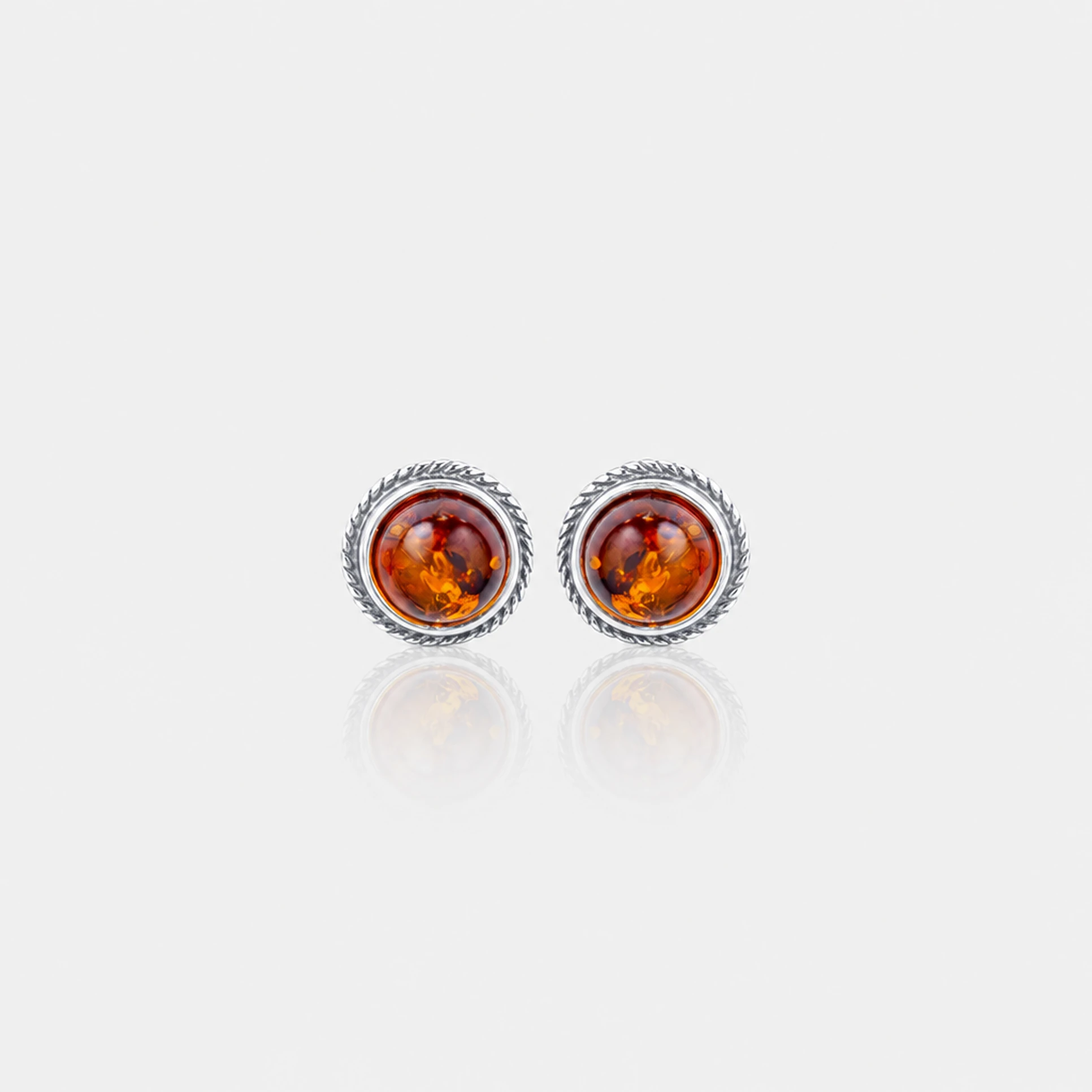 Mini studs i sølv med amber