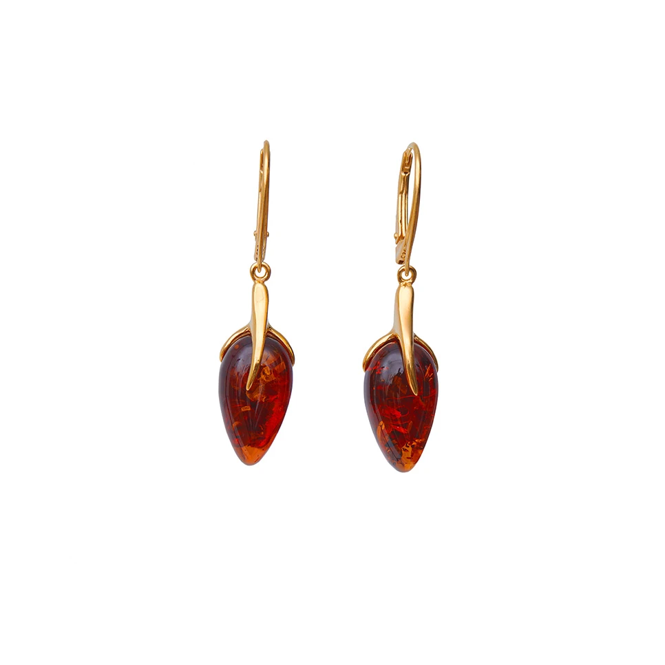 Thumbnail of Penelope gold earrings with cognac amber