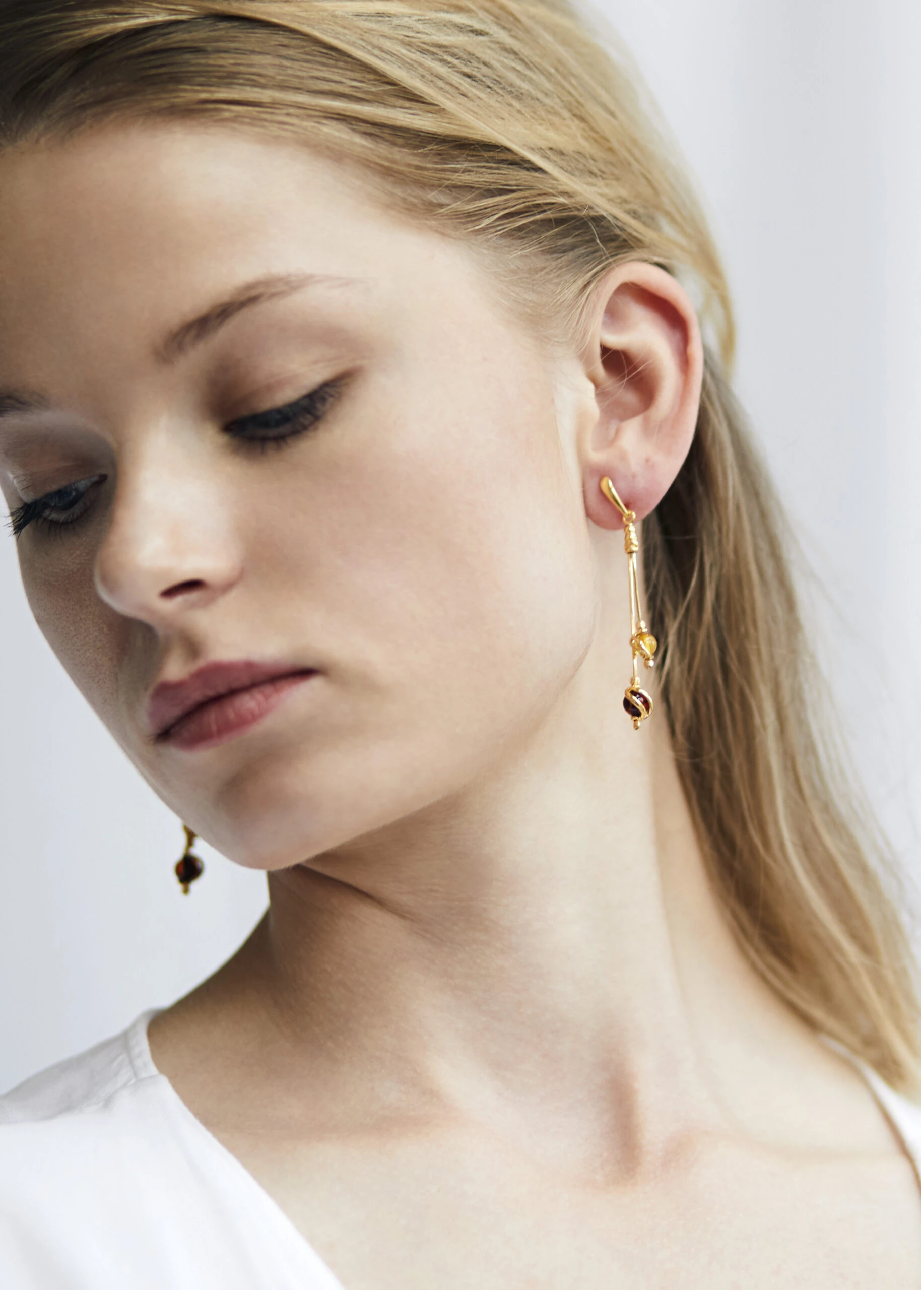 Thumbnail of Sophia gold earrings with amber