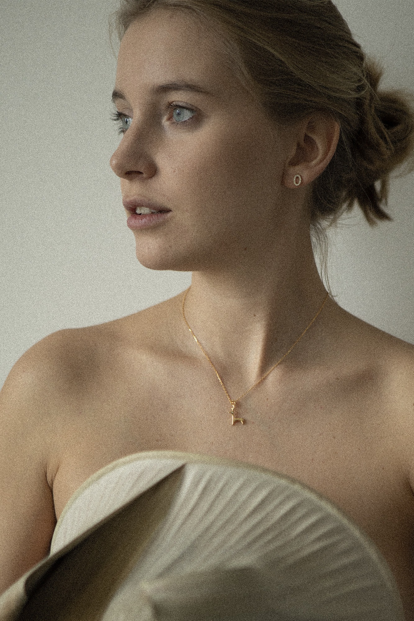 Thumbnail of Gold reindeer necklace