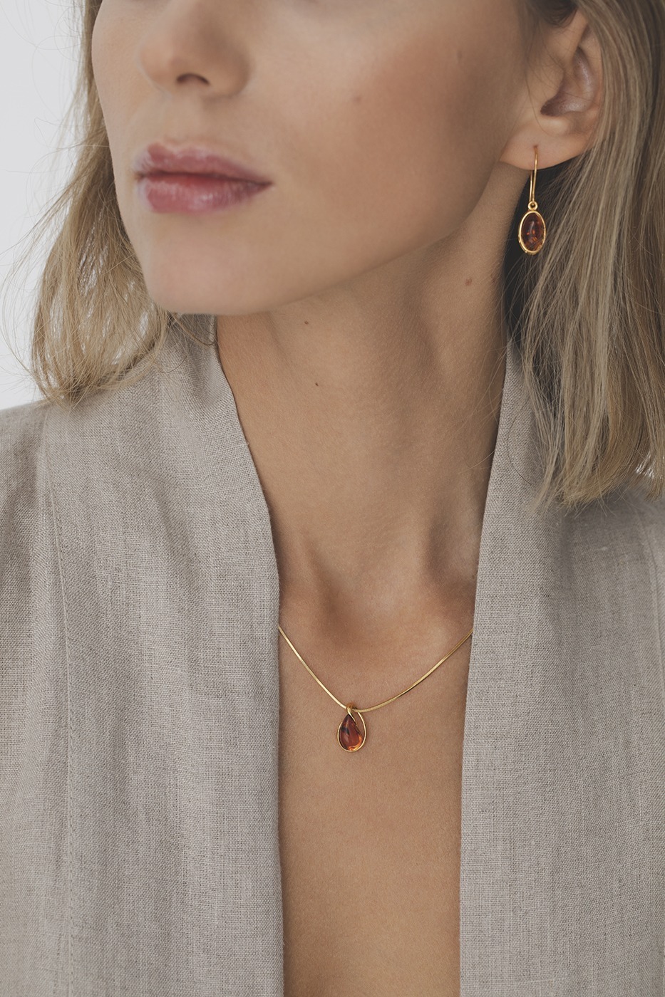 Thumbnail of Petite gold necklace with amber
