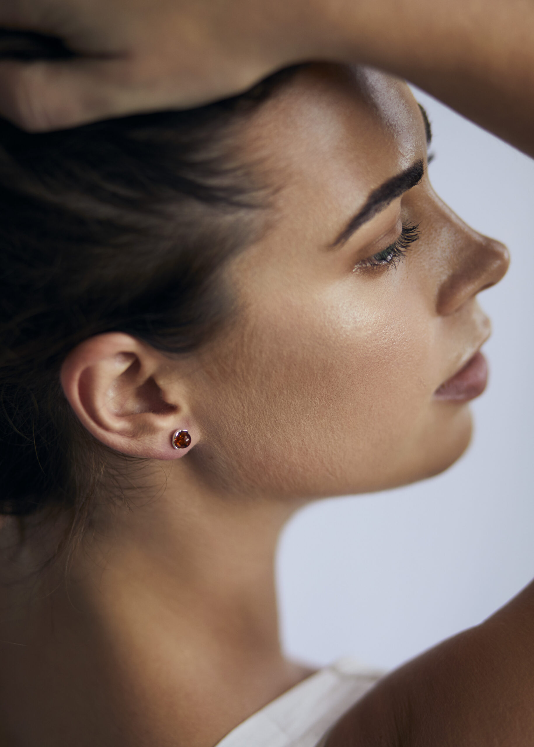 Silver stud earrings with amber