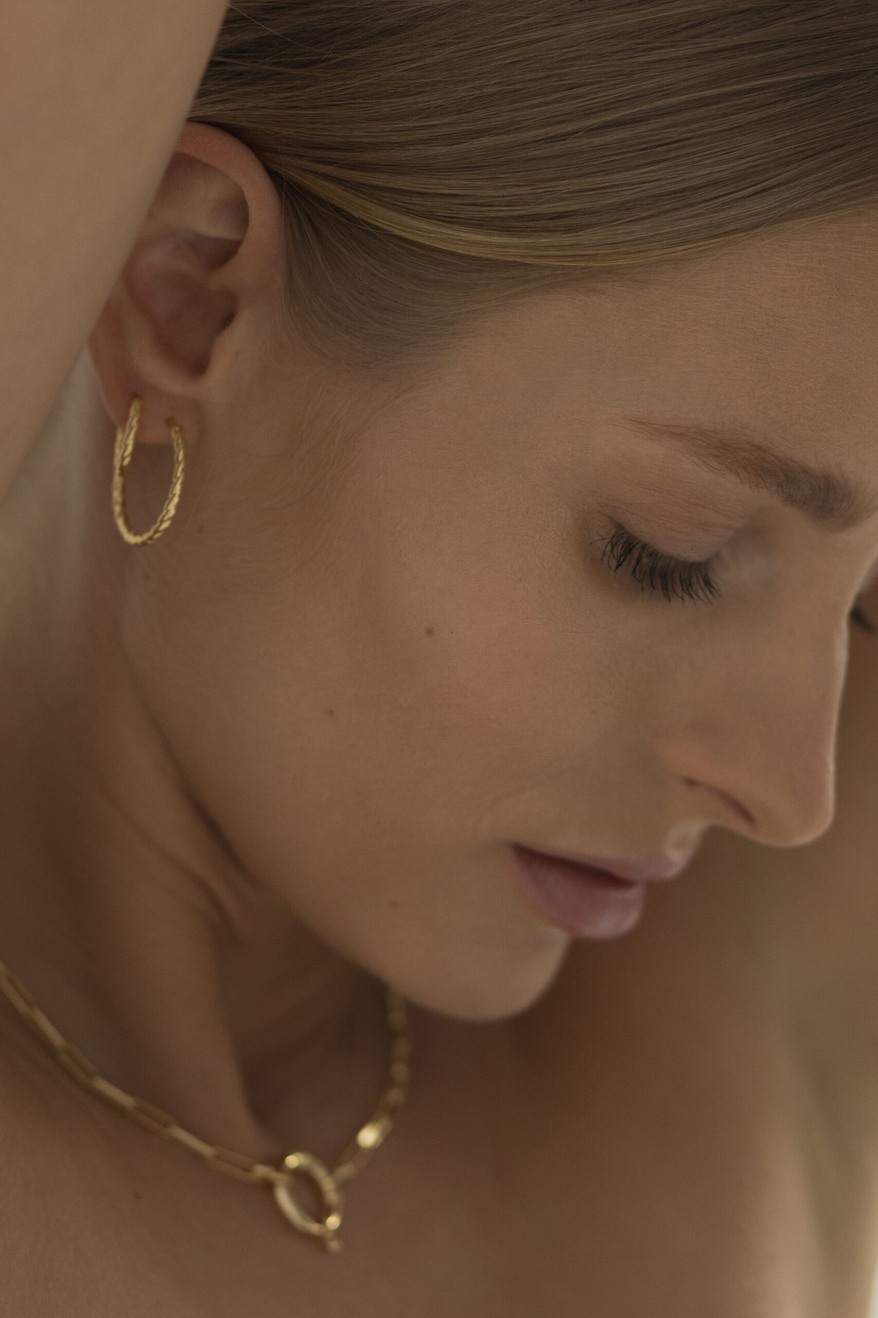 Twisted 24mm gold hoop earrings